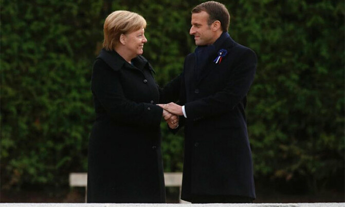 Macron and Merkel unite in struggle for Europe Macron and Merkel unite in struggle for Europe