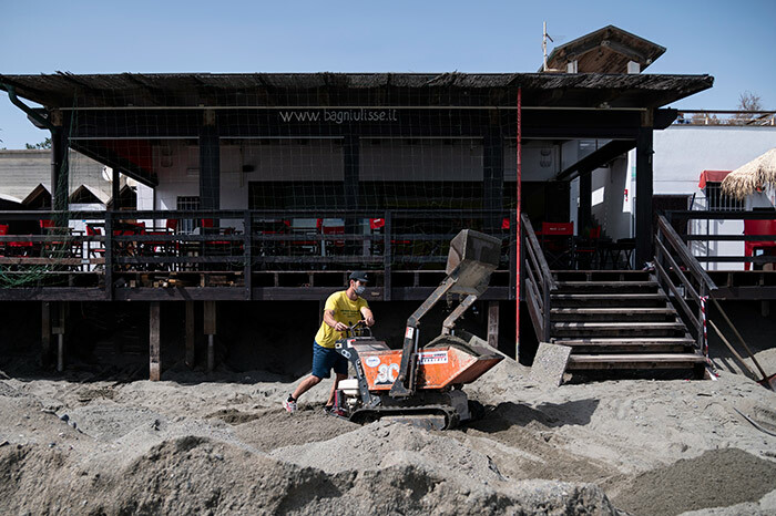  he owner of a bathing facility uses a selfloading mini dumper to set sand on a beach for the upcoming summer season on ay 14 2020 in lbissola arina near avona iguria during the countrys lockdown aimed at curbing the spread of the 19 infection caused by the novel coronavirus hoto by    
