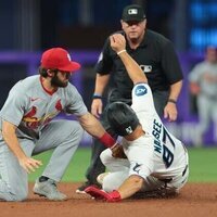 Marlins' solid pitching, hitting too much for Cardinals