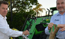  MLA Program Manager Sustainable Feedbase Resources, Cameron Allan with a grazier trying out Di-Bak Parkinsonia.