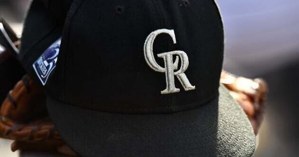 Broncos ownership buys reported 40% stake in Rockies