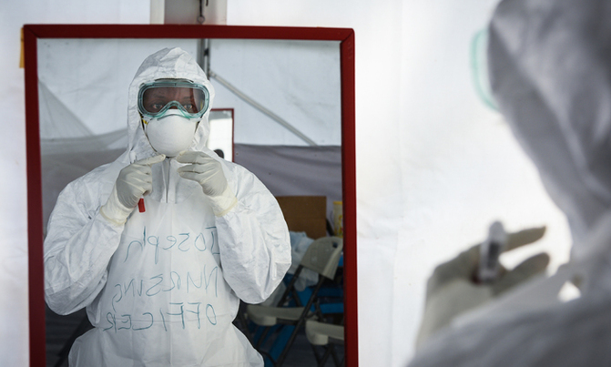Uganda begins trial of Ebola vaccine: health officials Uganda begins trial of Ebola vaccine: health officials