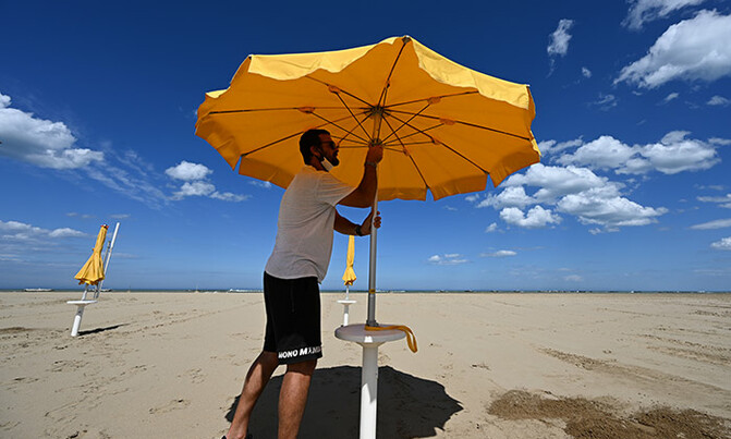 Under the sun, and threat of virus, Italy readies its beaches Under the sun, and threat of virus, Italy readies its beaches