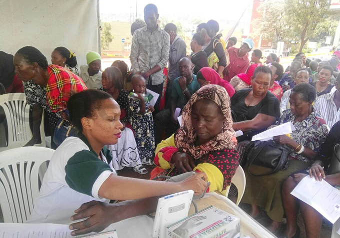  woman gets her blood pressure checked on hursday morning hoto by iriam amutebi
