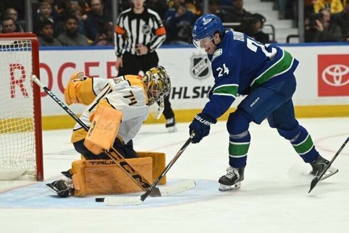 Late comeback propels Canucks to shootout win over Predators