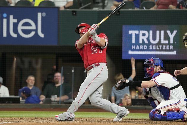 Seven-run inning powers Rangers past Angels