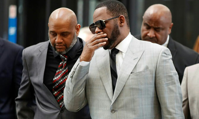 R. Kelly arrested on child pornography charges R. Kelly arrested on child pornography charges
