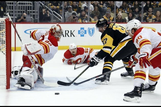 Evgeni Malkin scores shootout winner as Pens edge Flames