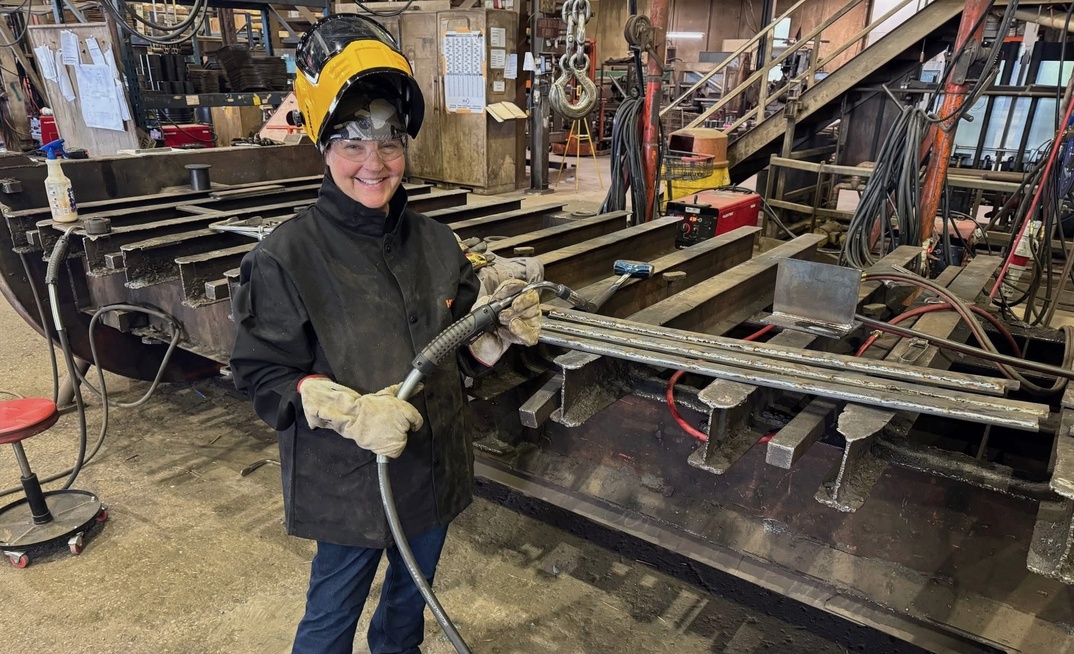 Philippi-Hagenbuch chief executive Danette Swank learns about welding at the company's facility in Peoria, Illinois