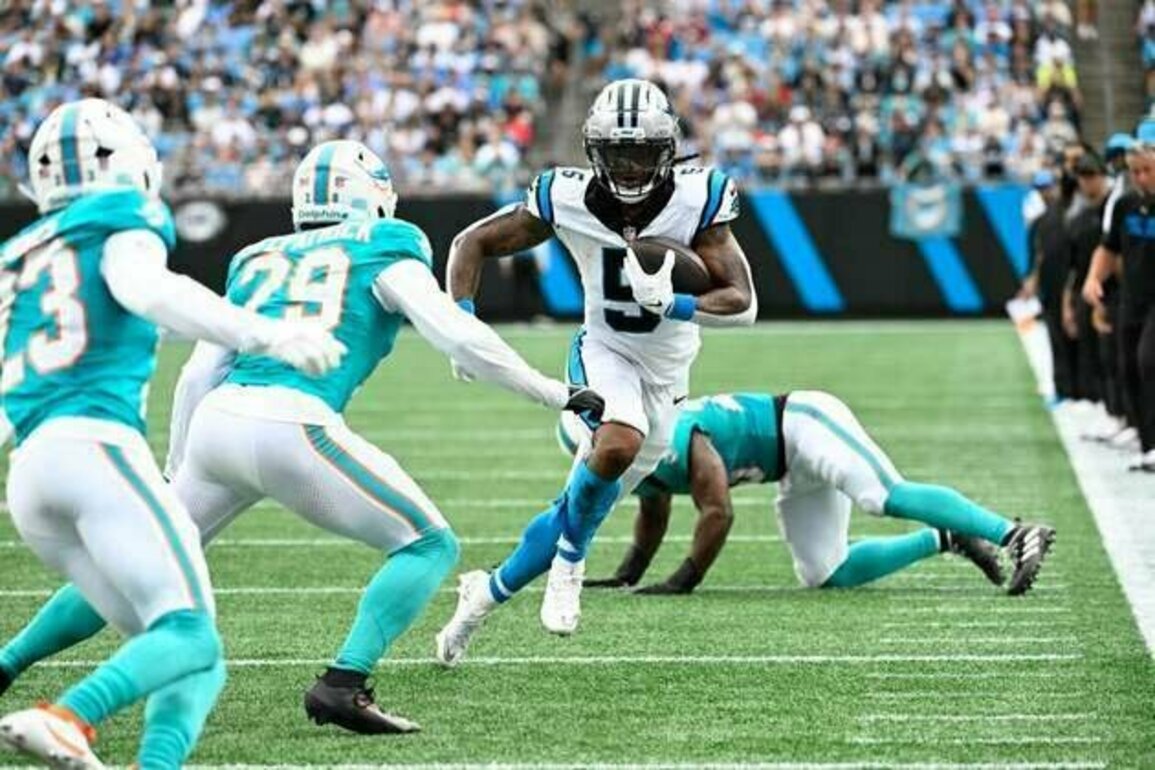 Rico Dowdle's big game helps Panthers rally past Dolphins