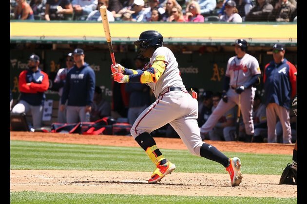 Braves hold down A's in 4-2 win to avoid road sweep