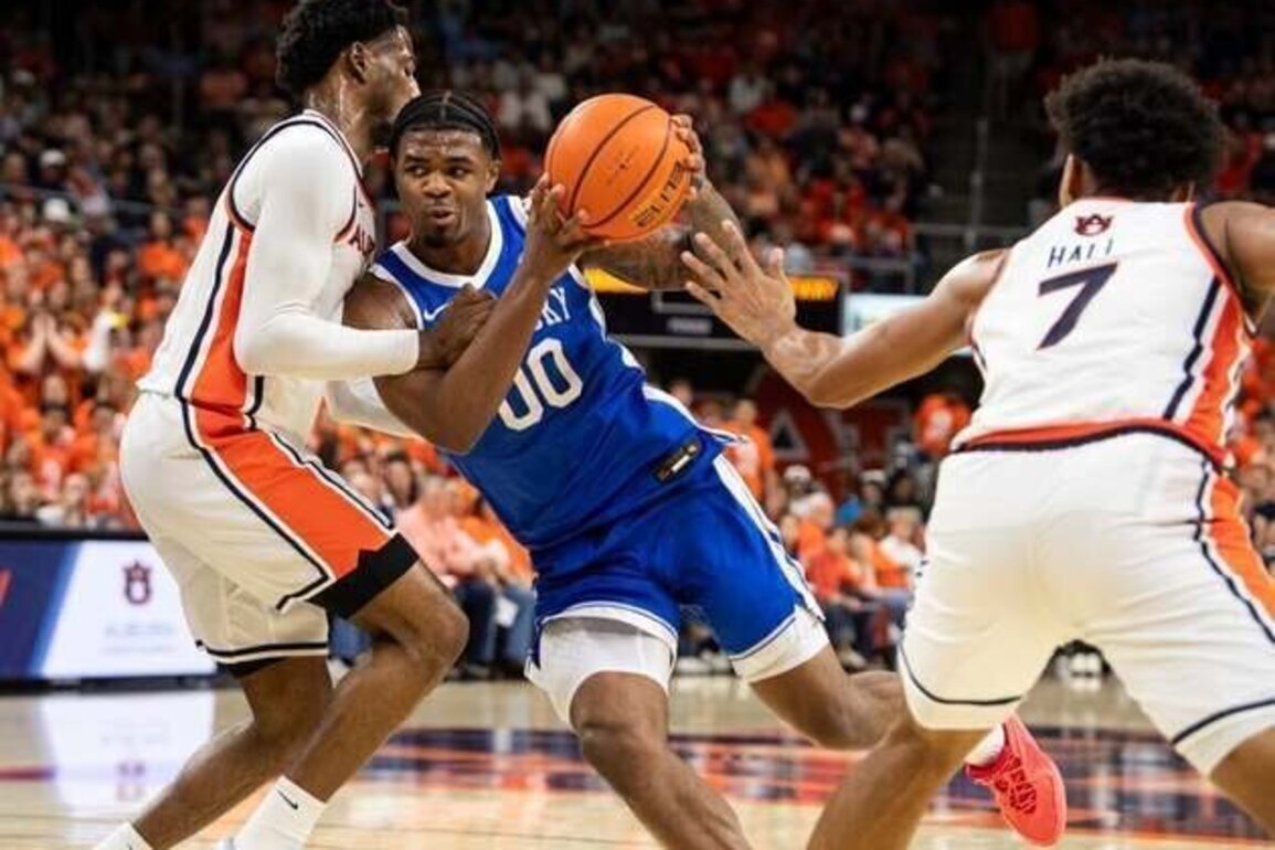 Auburn edges Kentucky on Elyjah Freeman's last-second tip-in