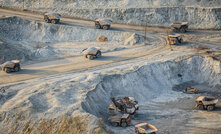 Mine trucks on the road to the ore crushers. Source: Grupo Mexico