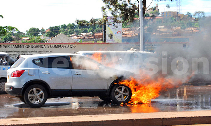 Gov't car burns in Kampala Gov't car burns in Kampala