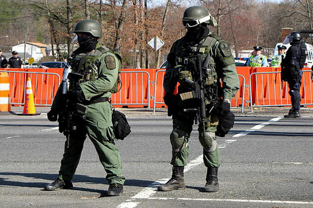 Masked ICE agents become symbol of 2025 crackdown