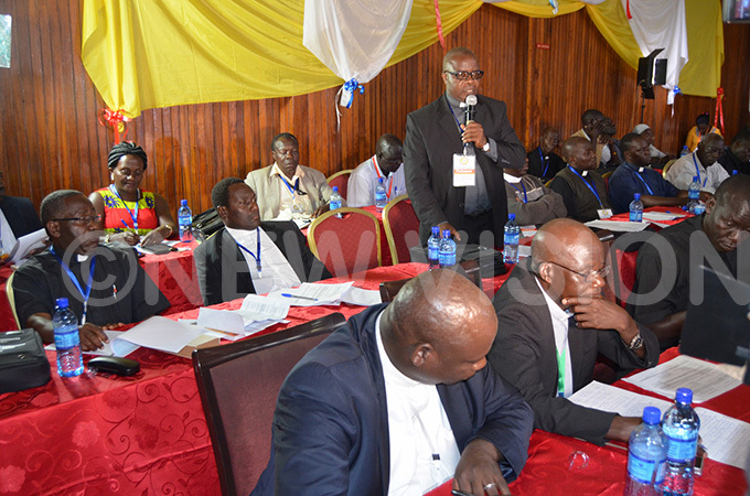  ne of the delegates r mmanuel imbowa makes a submission as other participants listen