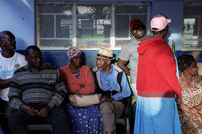 amibians wait in line to access a polling station  hoto