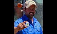  AirAgri's Paul Diamond with the pocket-sized tracking device to help farmer safety. Image courtesy AirAgri. 