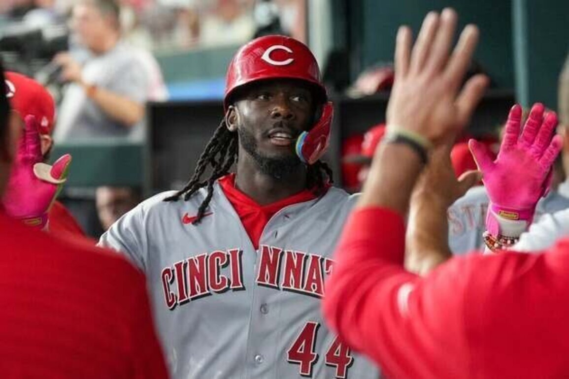 Reds spoil Rangers' home opener on ninth-inning HR