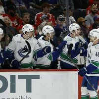Short-handed Canucks survive Capitals' furious rally
