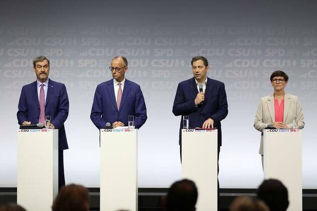 Germany's CDU/CSU, SPD sign coalition deal for new gov't