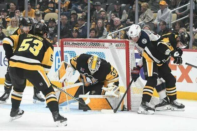Jackets let lead slip away, but sink Penguins in shootout