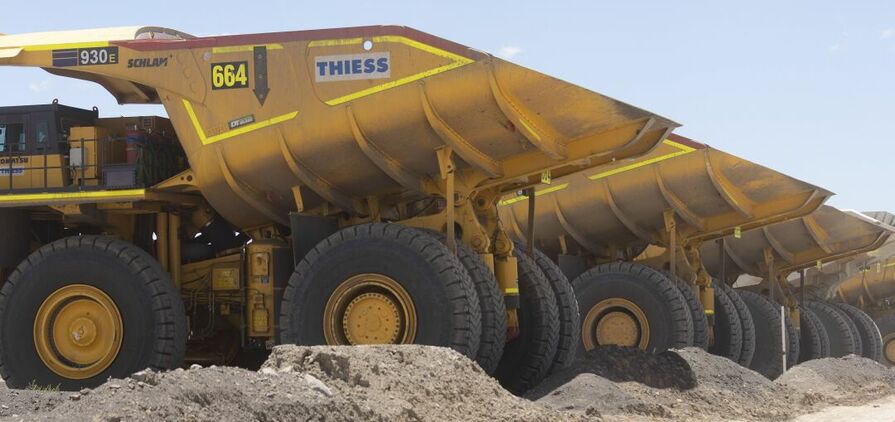 Thiess trucks at Lake Vermont.