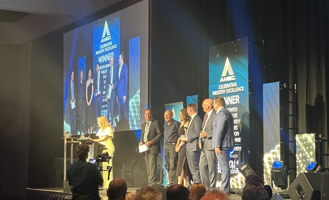 Peter Bewick accepts the Prospector Award alongside the Encounter Resources team