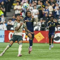 Whitecaps draw with Timbers thanks to Brian White's late goal