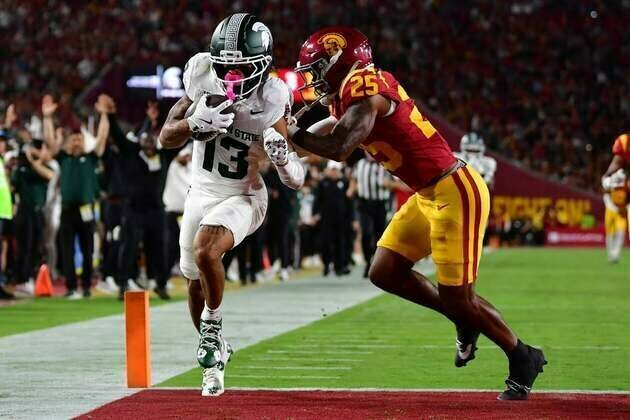 No. 25 USC builds big lead, withstands Michigan State rally