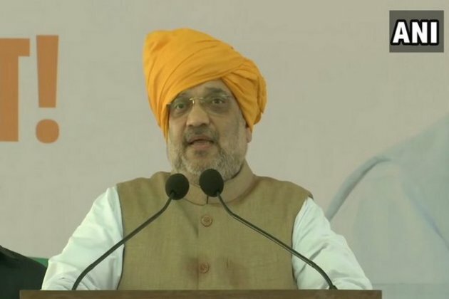 Shah asks Congress, NCP to clear stance on repeal of Article 370