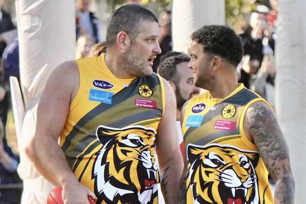 Brendan Fevola leads struggling footy side to victory, but it was bad news for singer Guy Sebastian