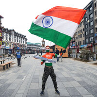Tourist paints himself in Tricolour as he marks 77th Republic Day at Srinagar's Lal Chowk