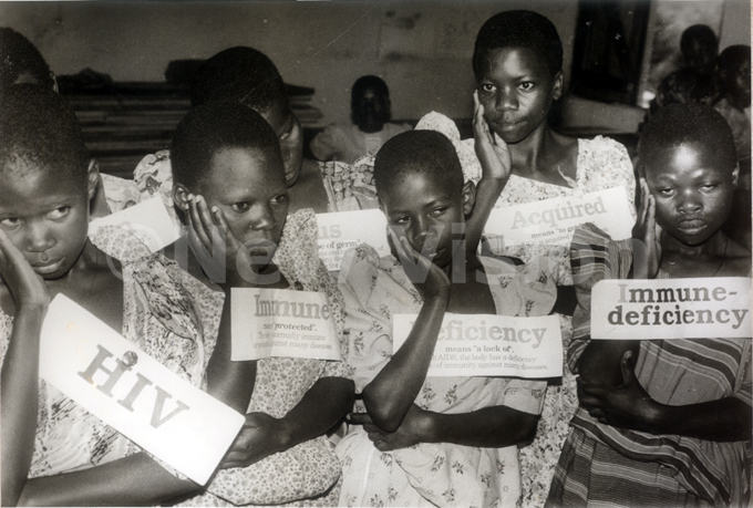 upilsof emuto hurch of ganda sing a song about the causes of  and its consequences on eptember 1997