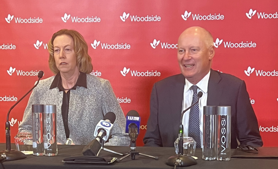 Woodside CEO Meg O'Neill and Chair Richard Goyder face media scrutiny at last year's fiery AGM in Perth.