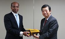 Adani Mining CEO Jeyakumar Janakaraj (left) and Komatsu president and CEO Tetsuji Ohashi.