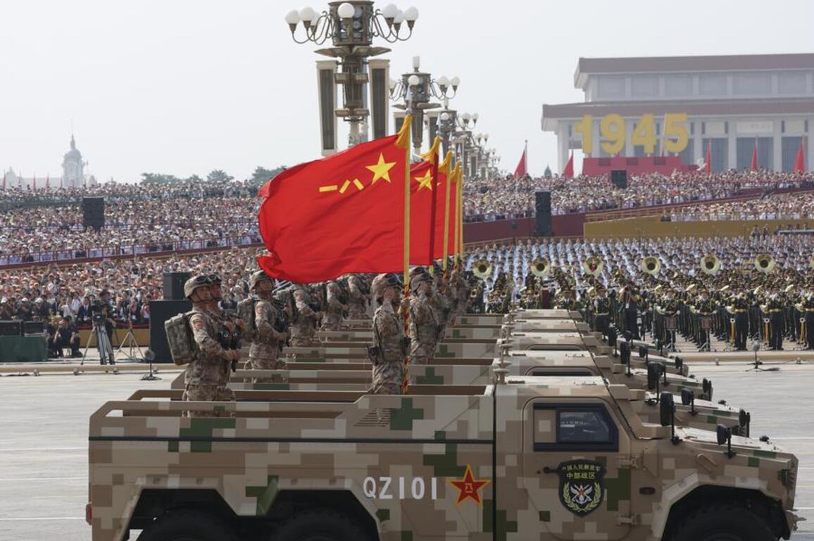 FOCUS | Hero units' banner formation marches through Tian'anmen Square during China's V-Day commemorations