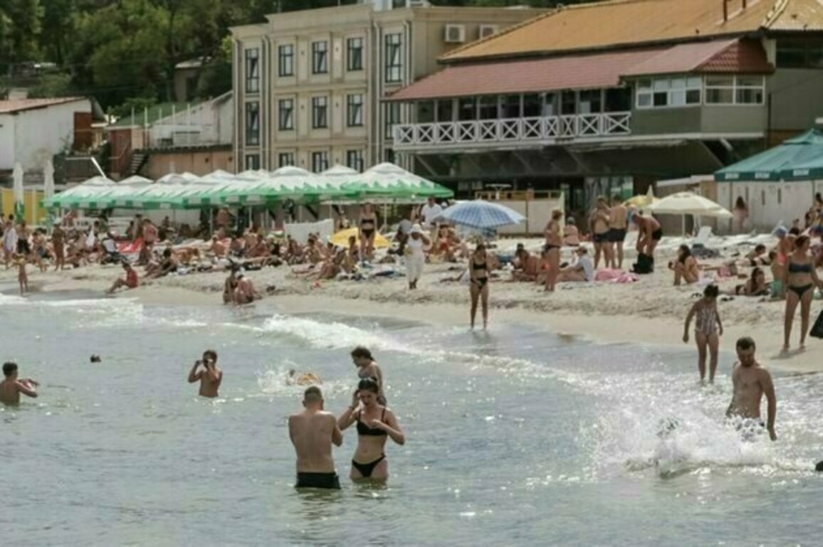 Exhausted By War, Ukrainians Seek Respite On Odesas Beaches