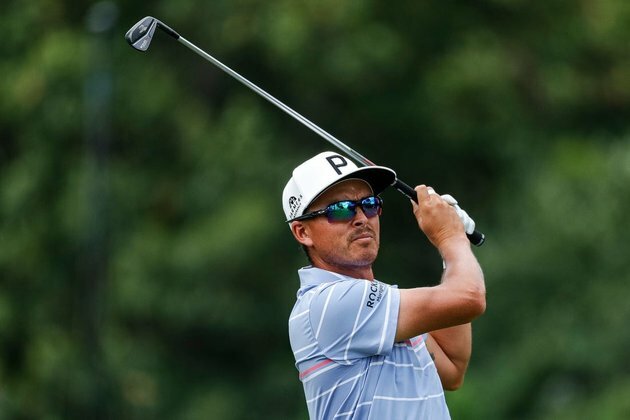 Rickie Fowler joins Tiger Woods for player meeting regarding LIV