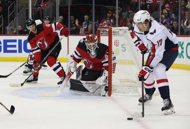 Streaking Devils drop Capitals behind Jack Hughes' hat trick