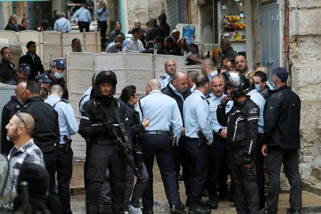 Palestinians march in honor of Jerusalem Temple Mount attacker