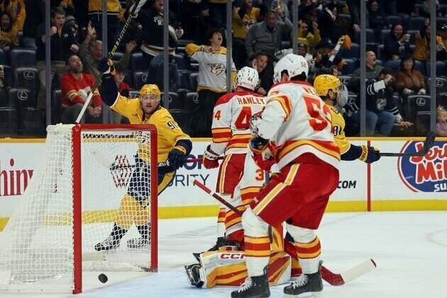 Predators strike for three in first, hold off Flames' rally