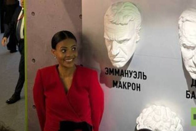 Candace Owens poses with Macron sculpture at SPIEF (PHOTOS)