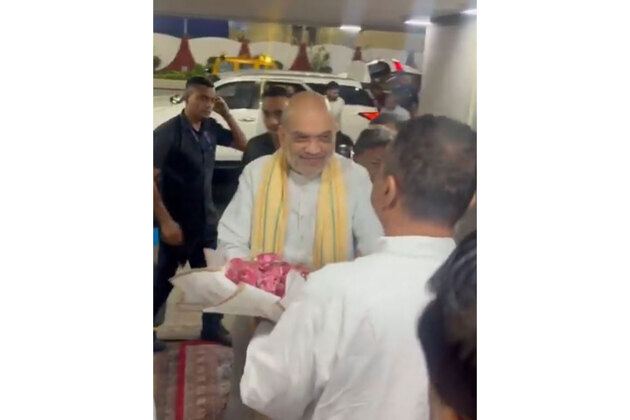 WB: BJP's Suvendu Adhikari receives Amit Shah at Kolkata airport