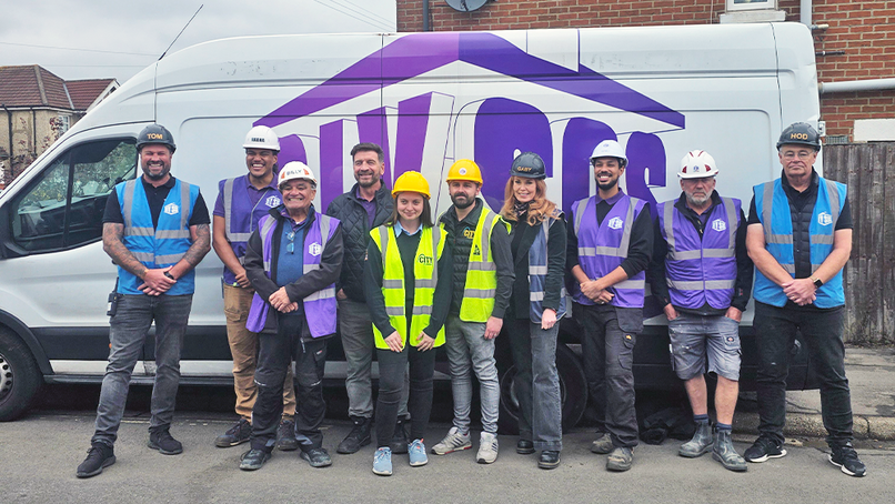 Libby Muir and David Wilson from City Plumbing Lymington with DIY SOS team.