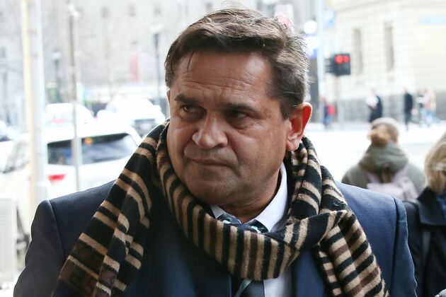 Footy icon behind one of the AFL's most famous moments fronts court over shocking allegations