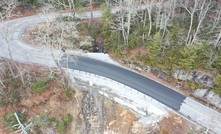  An aerial photograph of the repaired landslide section with GeoStabilization’s GCS wall roadway buildout