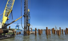 A Junttan’s HHK16S hydraulic impact hammer with Terramare’s crane attached leader installing the piles for the ferry terminal expansion in Turku
