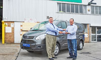 CCF scratch card competition winner claims new van