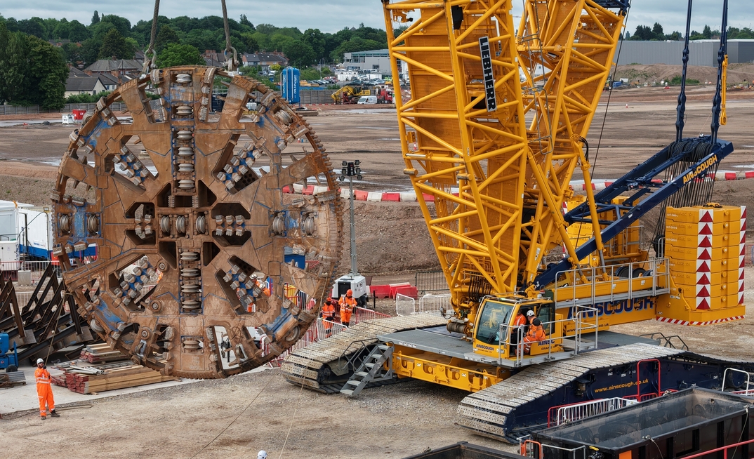 The cutterhead from HS2’s TBM Mary Ann being lifted out of the 3.5 mile tunnel it bored under Birmingham